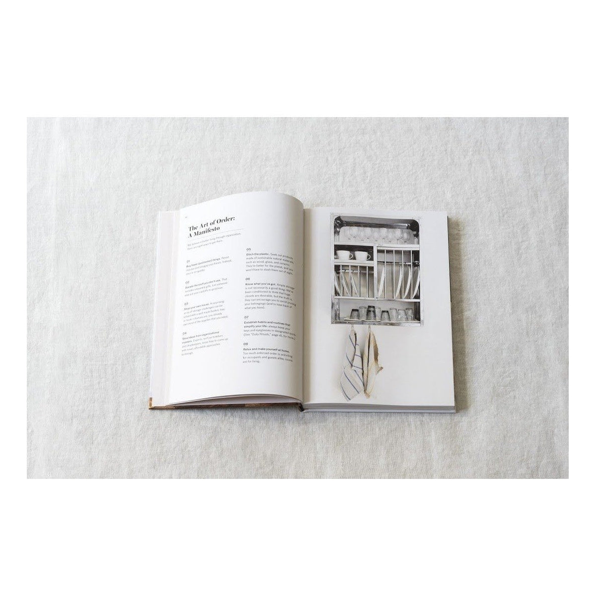Remodelista The Organised Home book page spread showing organising tools