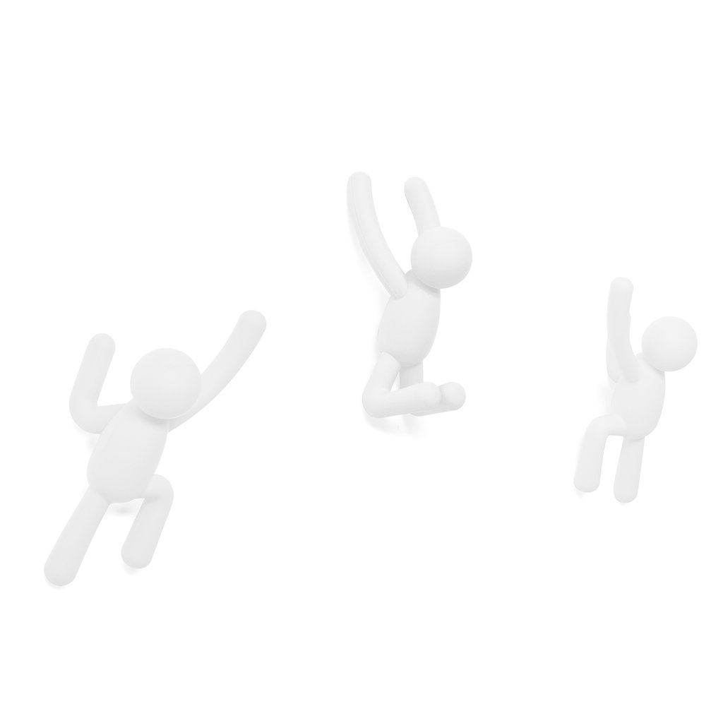 Three white Umbra Buddy figures mounted as wall hooks
