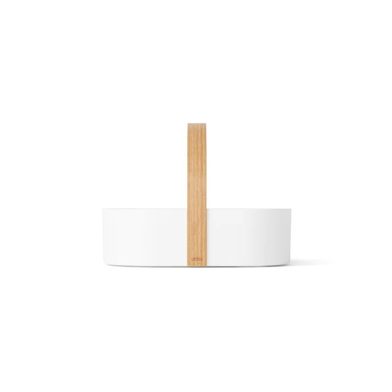 Umbra Bellwood caddy in white and natural, side view of the timber carry handle
