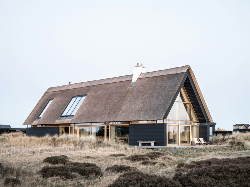 The Nordic Home page spread showing a cabin retreat