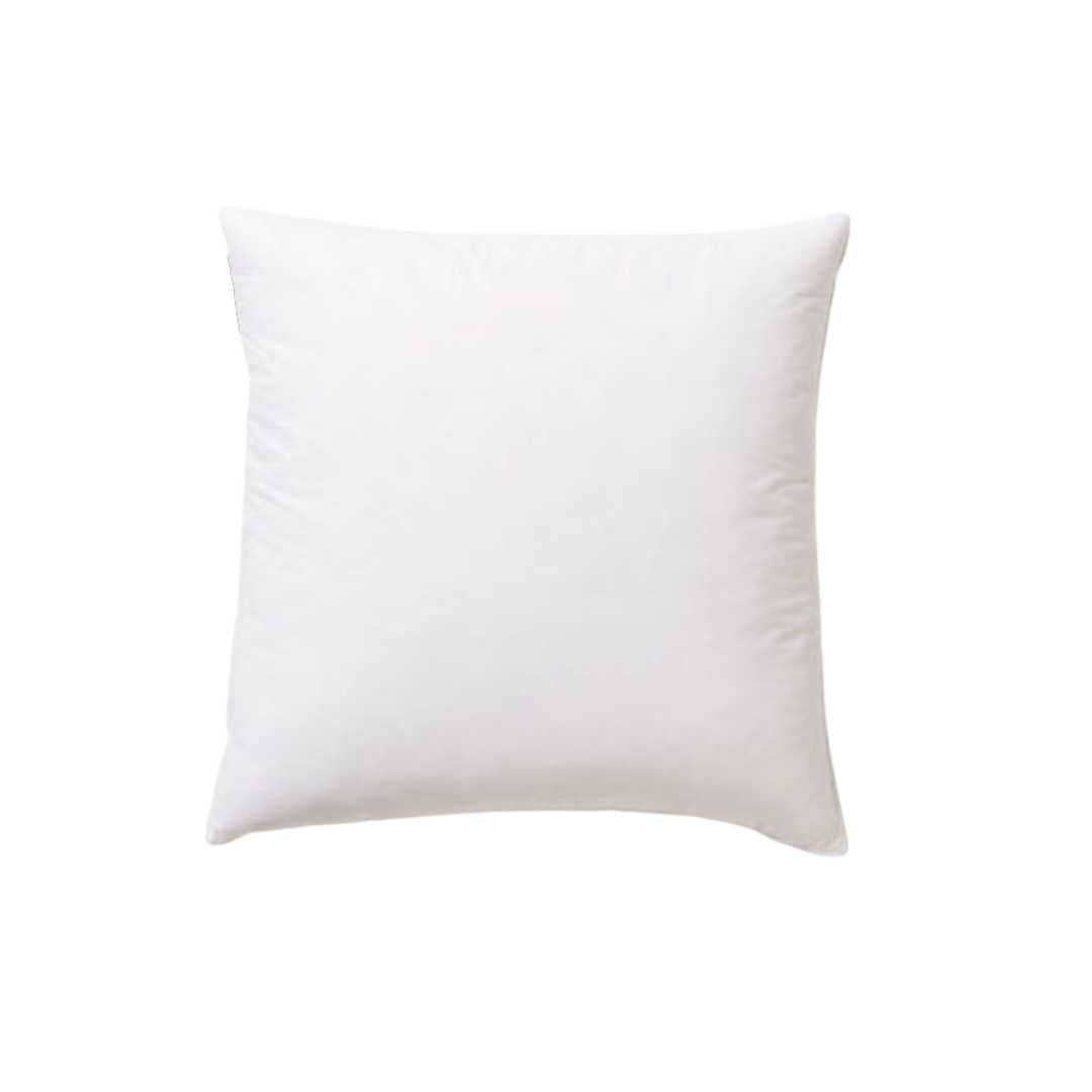Square cushion inner plumped and standing on one corner, white cotton cover