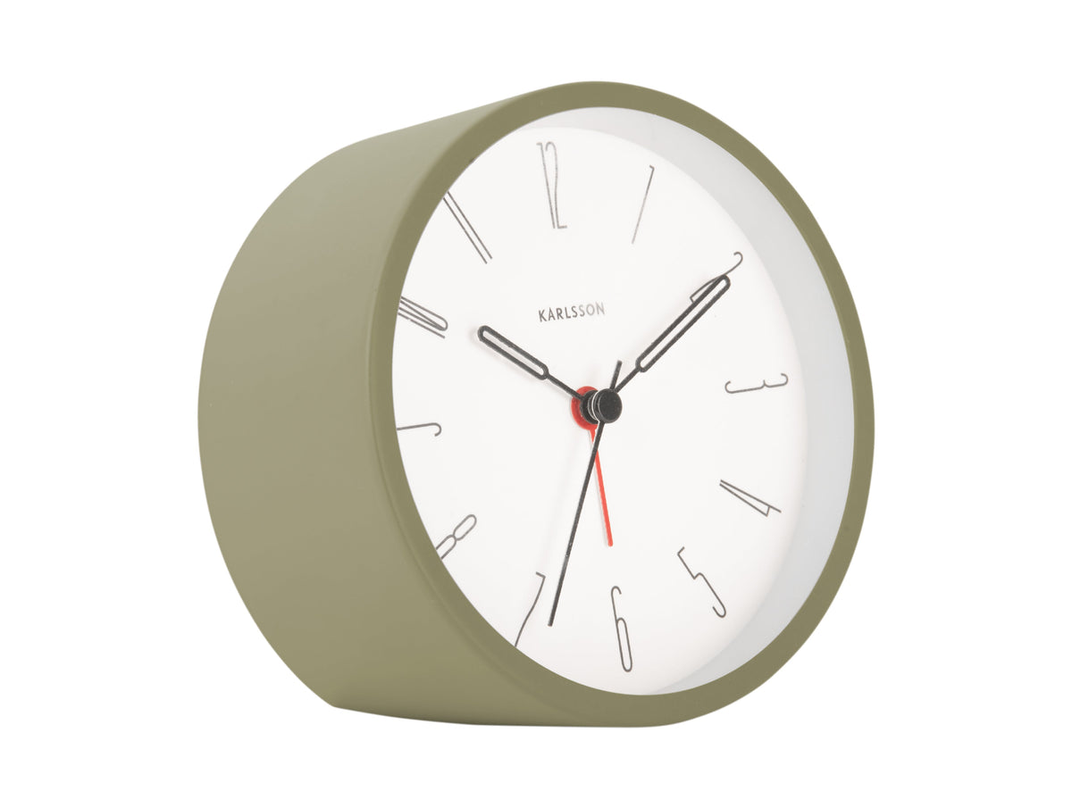 Karlsson Belle alarm clock in Moss Green, angled on a white background