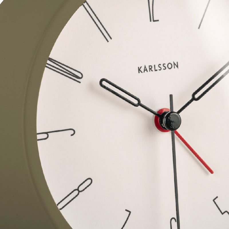Close-up of the Moss Green Belle alarm clock dial