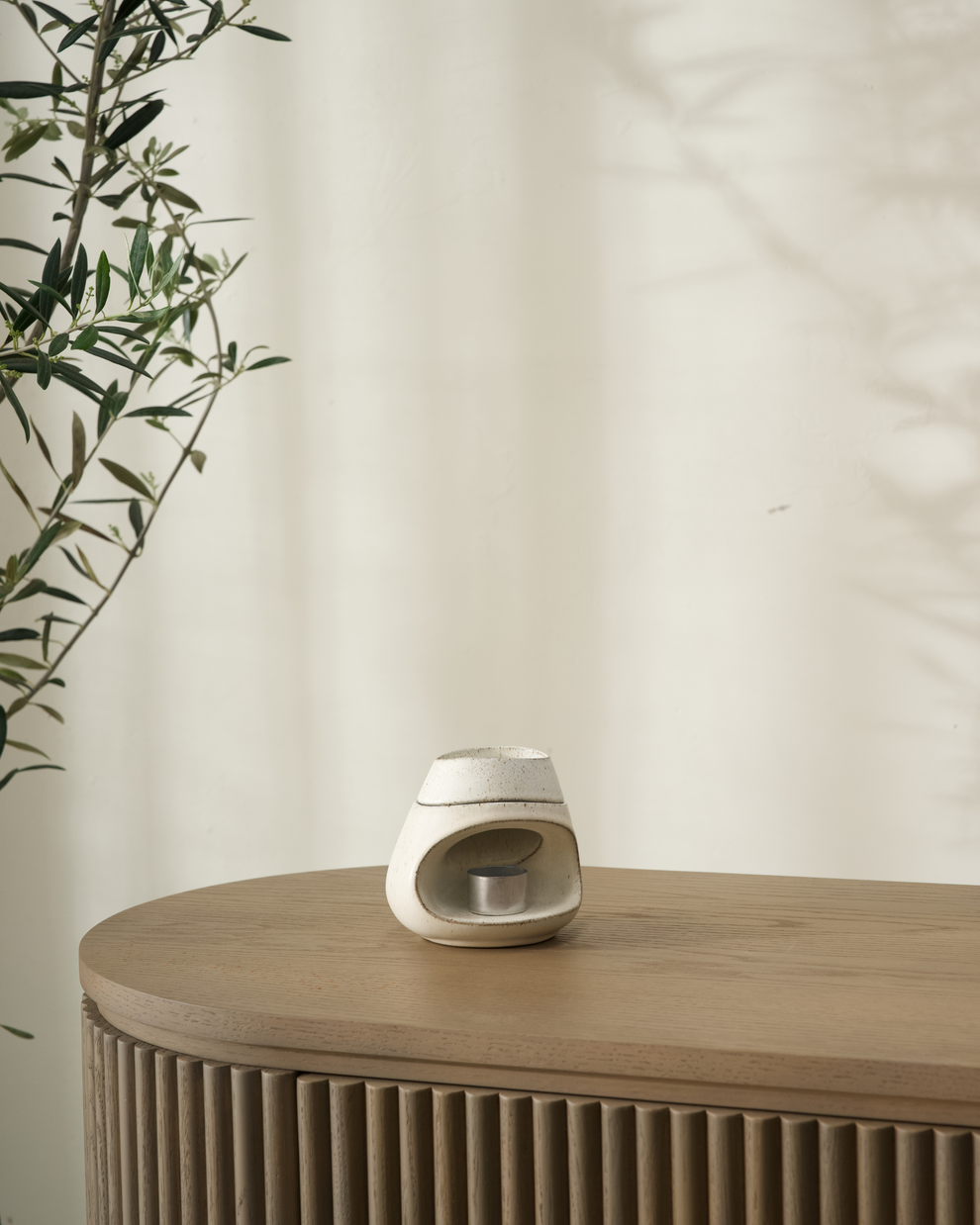Fort Ceramic Wax Burner styled near a basin for a spa-like feel
