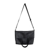 Black shoulder bag with a strap on a white background