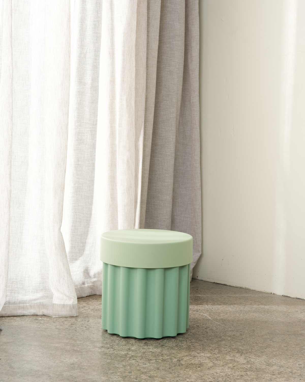 Harry Storage Stool close-up showing the sculptural shape
