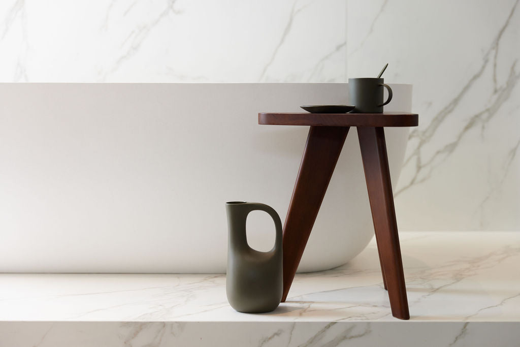 KHW Side Table in walnut styled beside a sofa