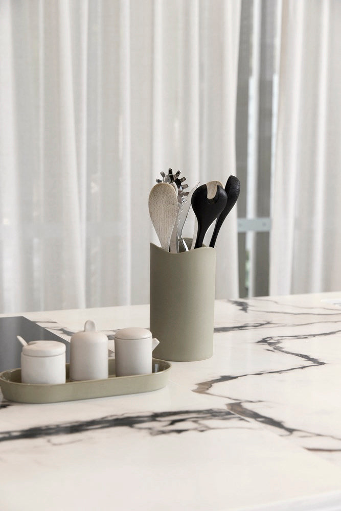 Jos Utensil Holder styled with dried eucalyptus on a kitchen counter