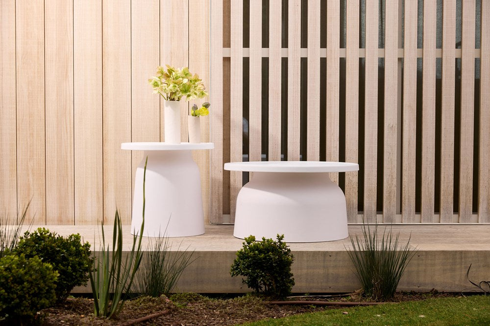 Maddison Side Table styled on a patio with a planter