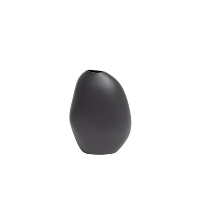 An organic seed-like shapes Harmie Vase - Stone Black handcrafted by Vietnamese Artisans, offered by Ned Collections.