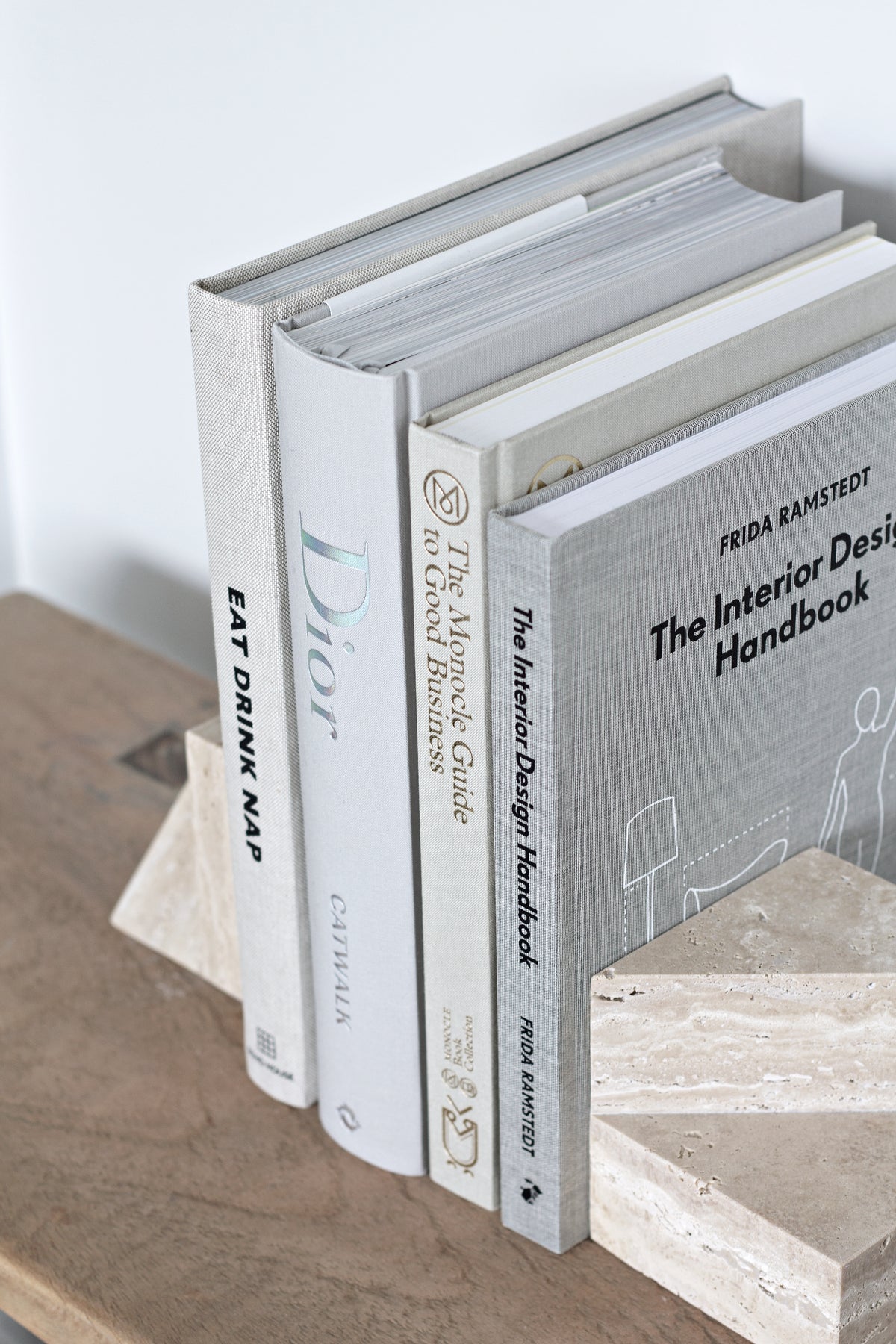 Dior Catwalk book styled in a living room setting