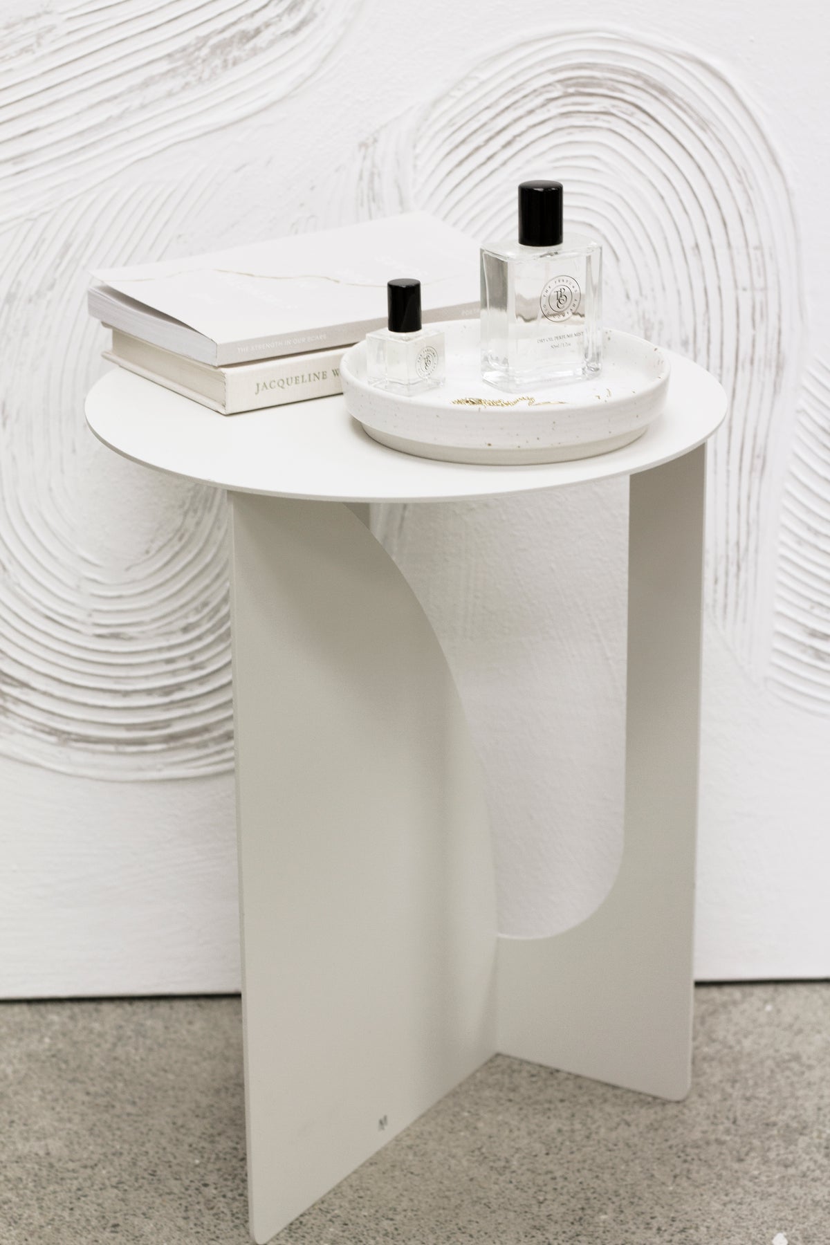 Arch Side Table White styled in a bedroom by Made of Tomorrow