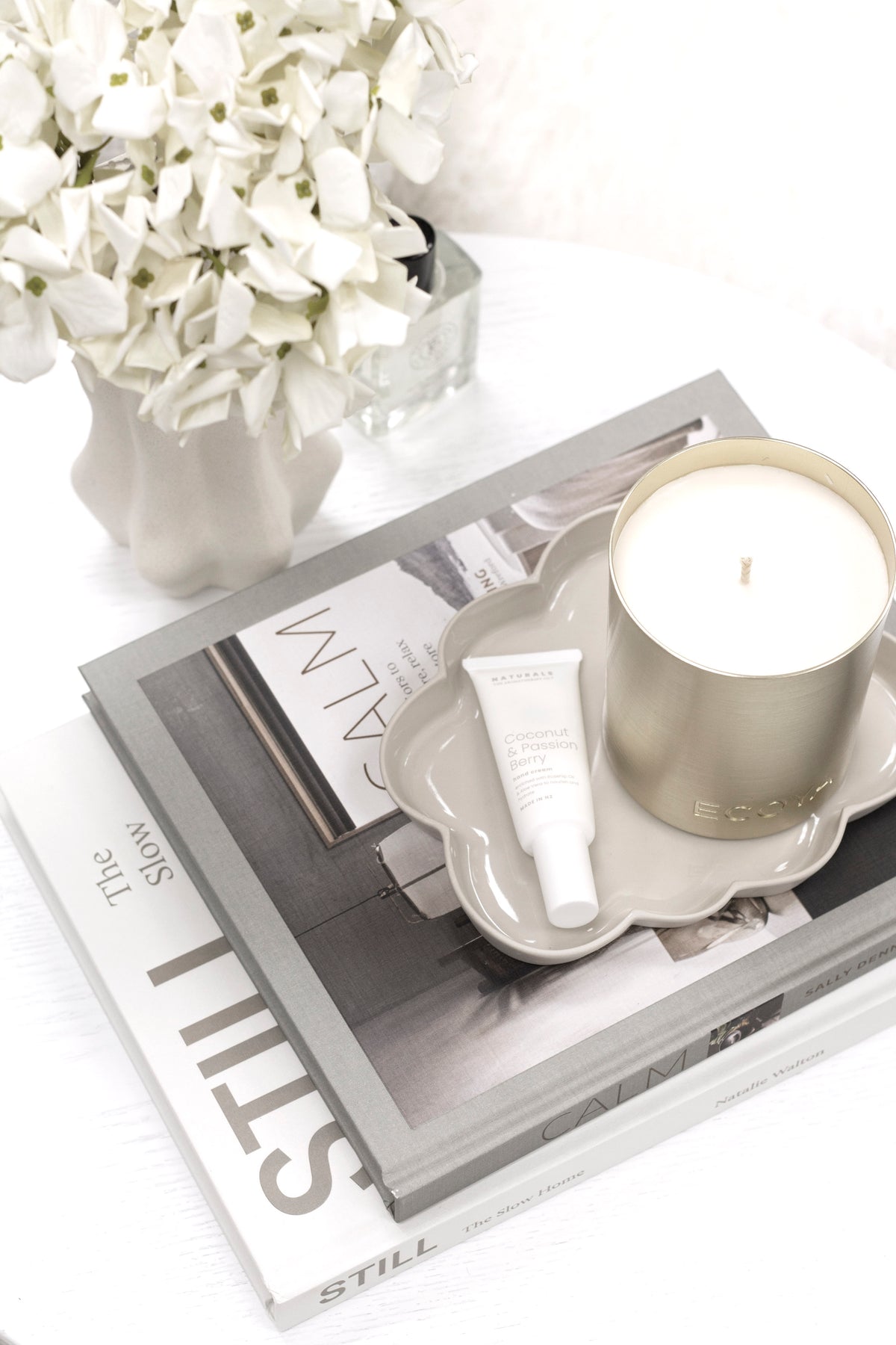 Calm interiors book styled on a coffee table