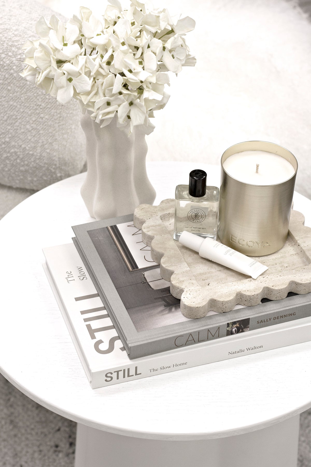 Still The Slow Home book styled flatlay with neutral decor