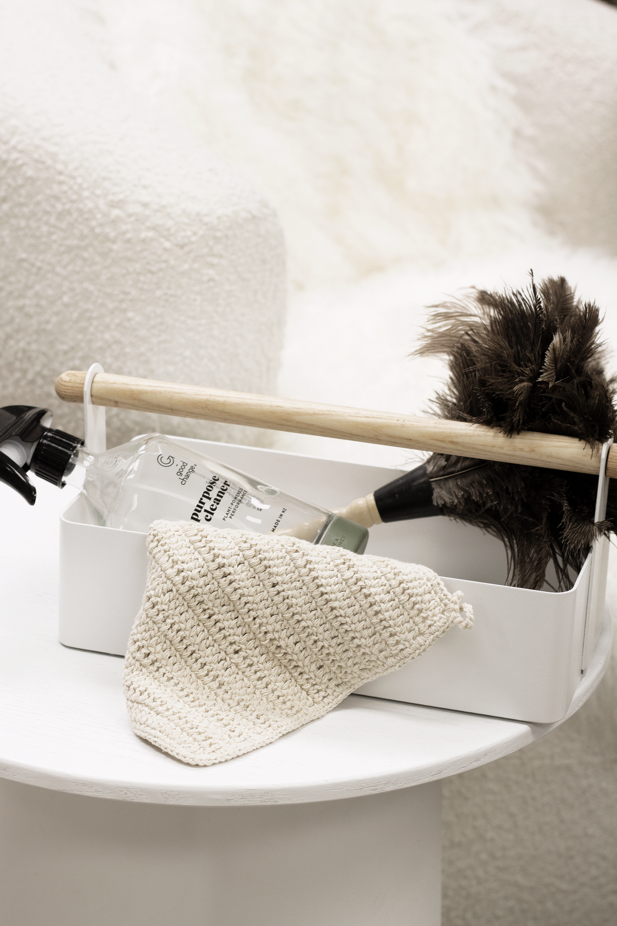 Good Change refillable spray bottle styled with natural cleaning products