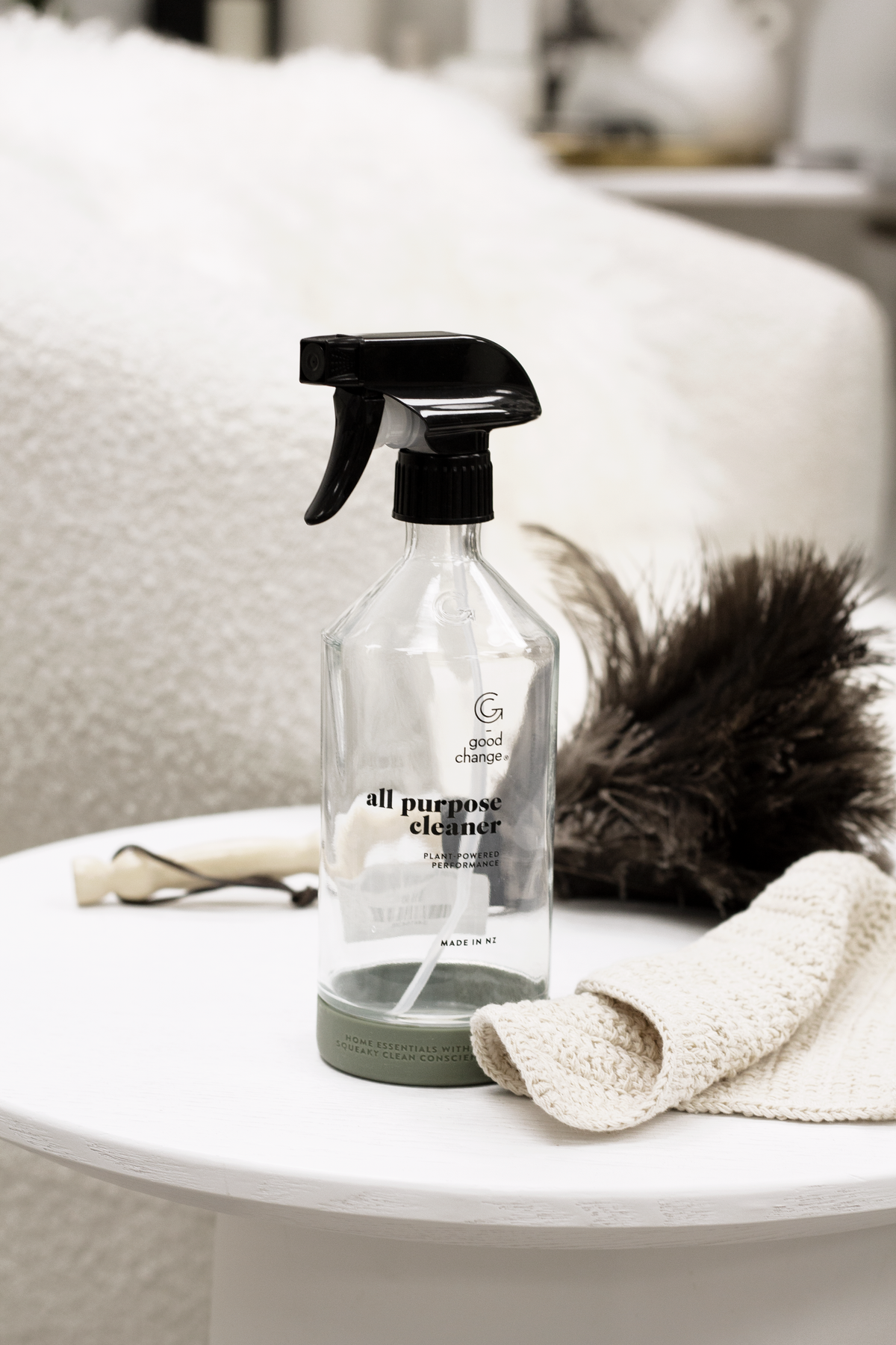 Good Change all-purpose reusable spray bottle styled in a home setting