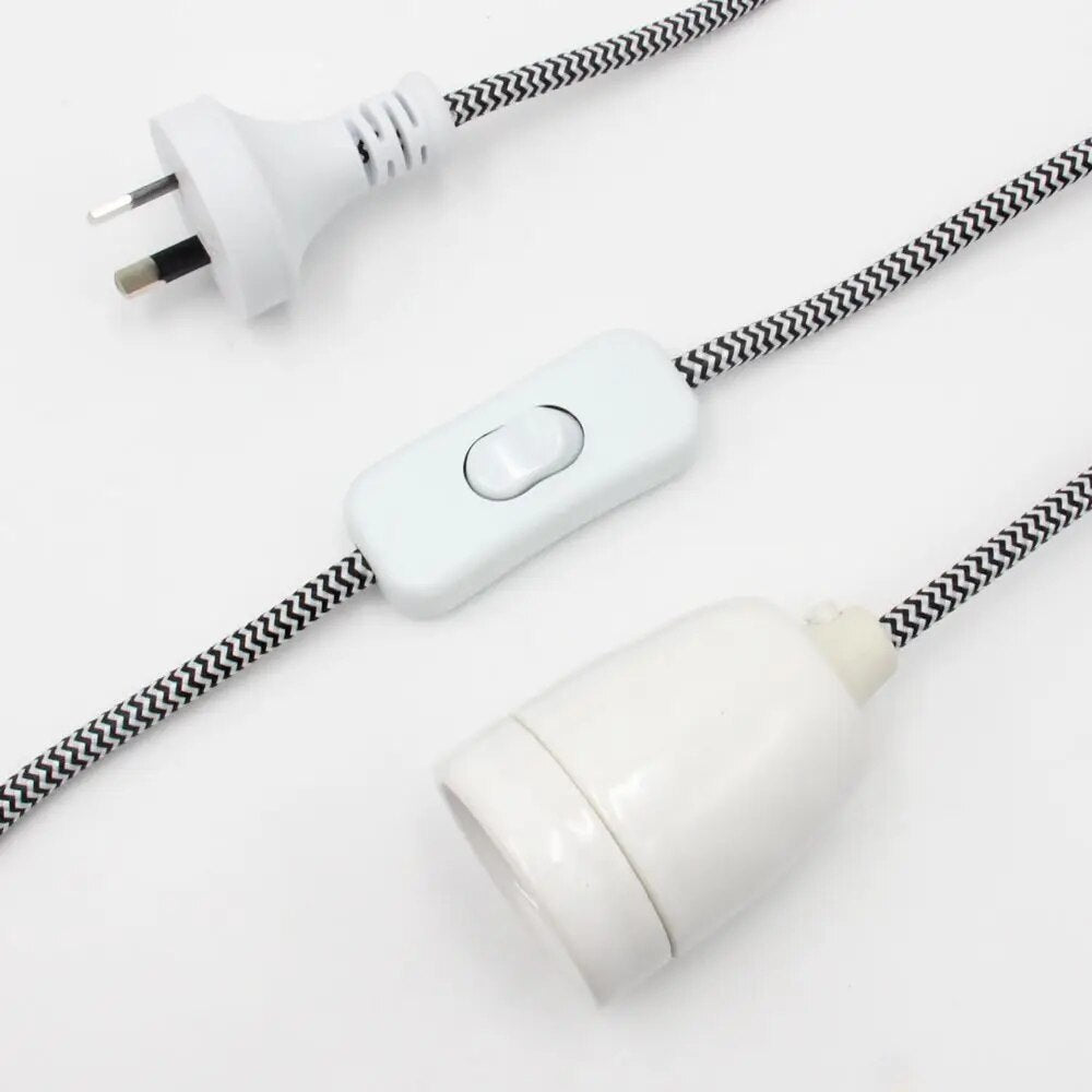 Close-up of the black and white flex with inline switch, plug and lamp holder