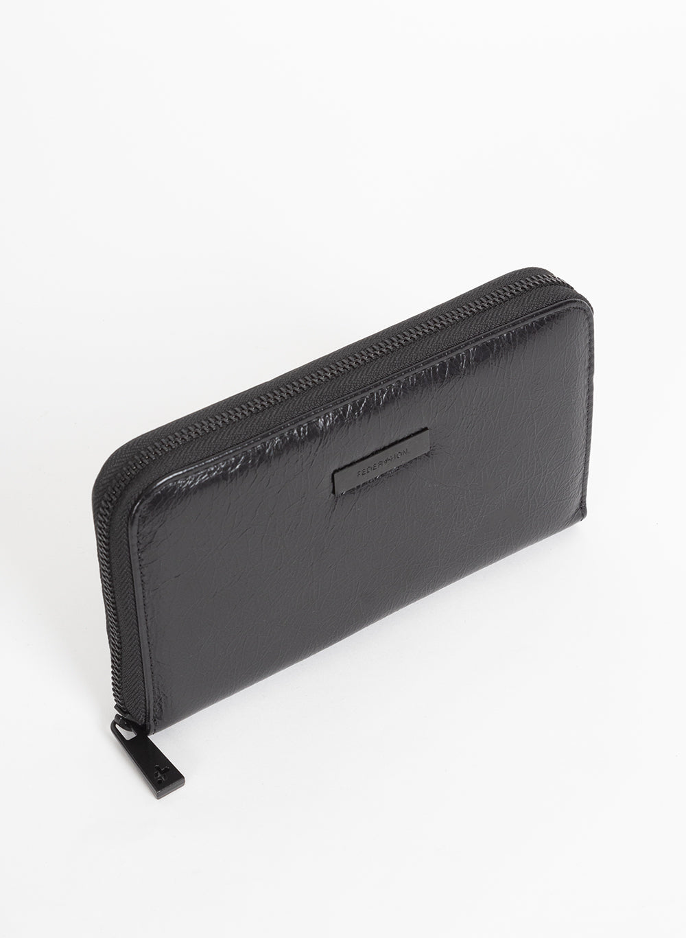 Black Minky zip wallet at an angle showing the zip pull