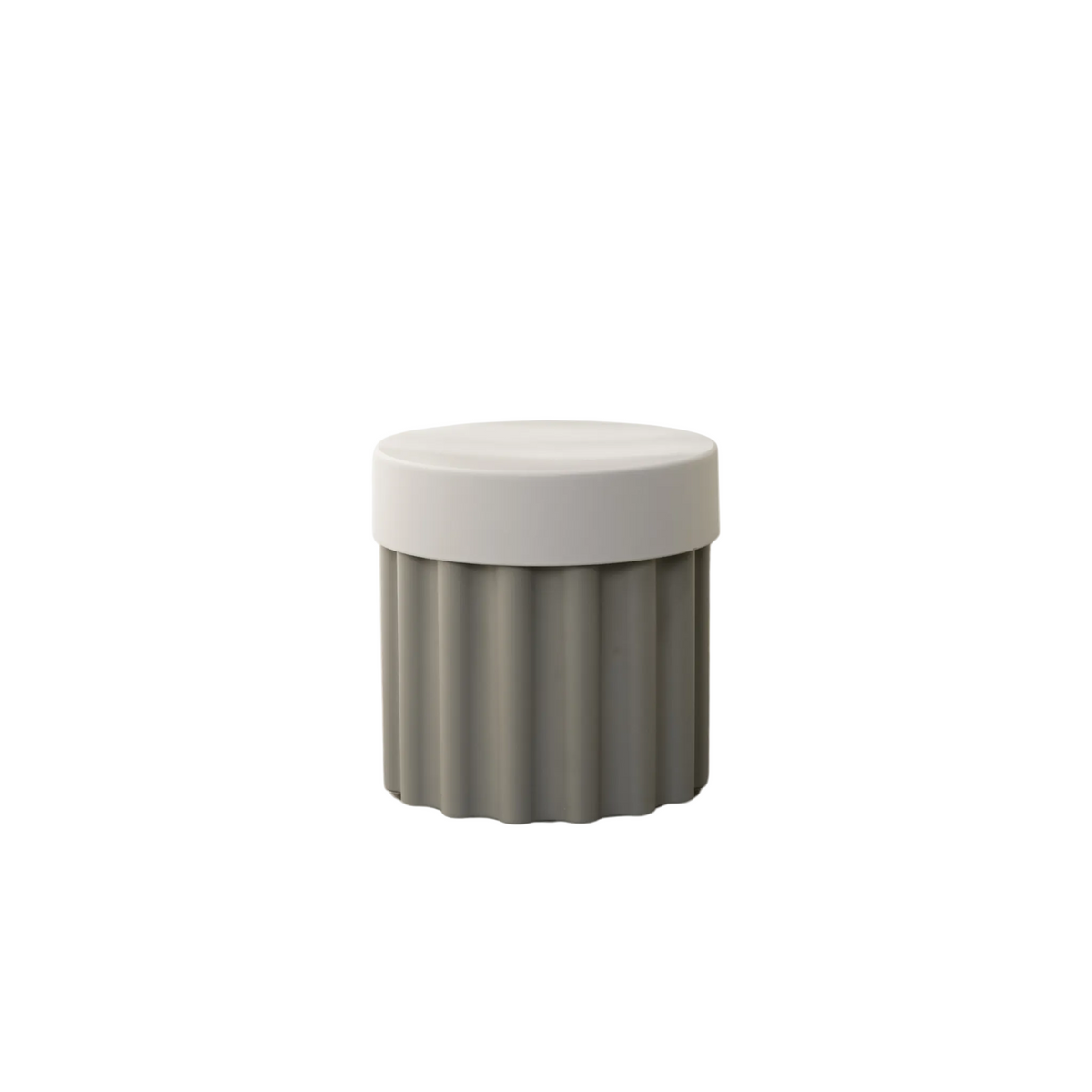 Harry Storage Stool by Ned Collections used as a side table