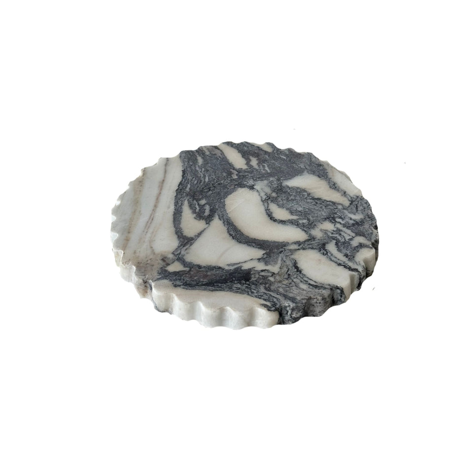 Elle petal edge Calcutta marble tray styled with candle and jewellery