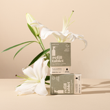 Good Change refill cleaning tablets styled beside a white lily