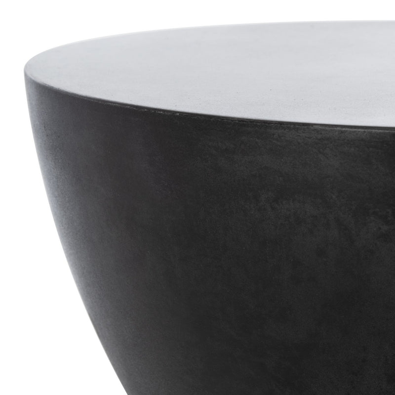 A Flux Home Westside Round Accent Table - Stonewash / Black, a lightweight black side table with a modern design, on a white background.
