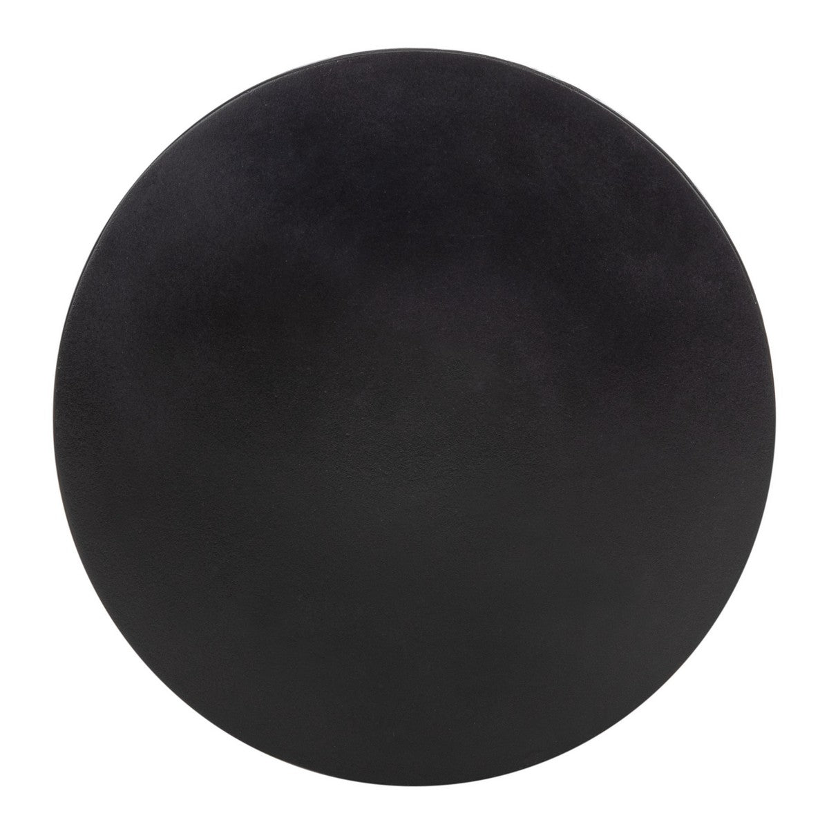 Looking straight down on the black table top, a plain dark circle
