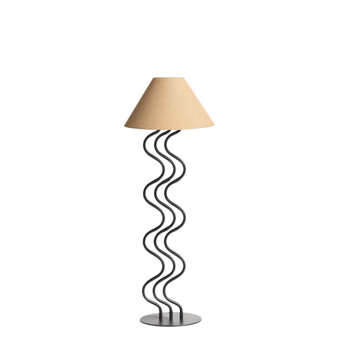 Surge floor lamp with a black wavy steel stem and natural linen shade on a white background
