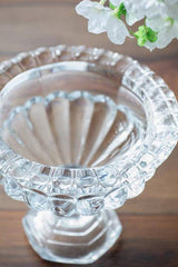 Louisa footed glass pedestal bowl small size styled with blossom on a wood table