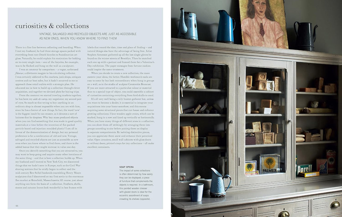 Spread from Inside Stories with text beside a glass-fronted cabinet of ceramics