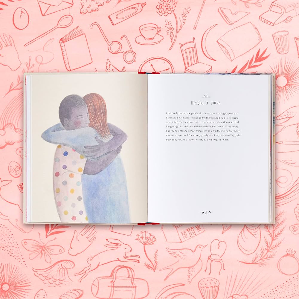 Book open to a painting of two people hugging, on a pink patterned backdrop