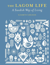 The Lagom Life by Elisabeth Carlsson book cover in dusty blue with Swedish folk art pattern, hardback wellbeing book
