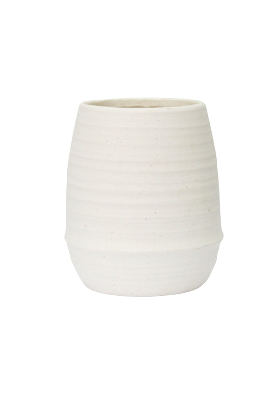 Small Alma ribbed ceramic vase in matte chalk on a white background