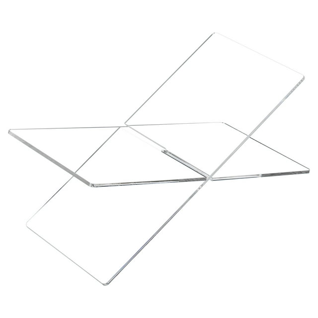 Clear acrylic X-shape book holder on a white background