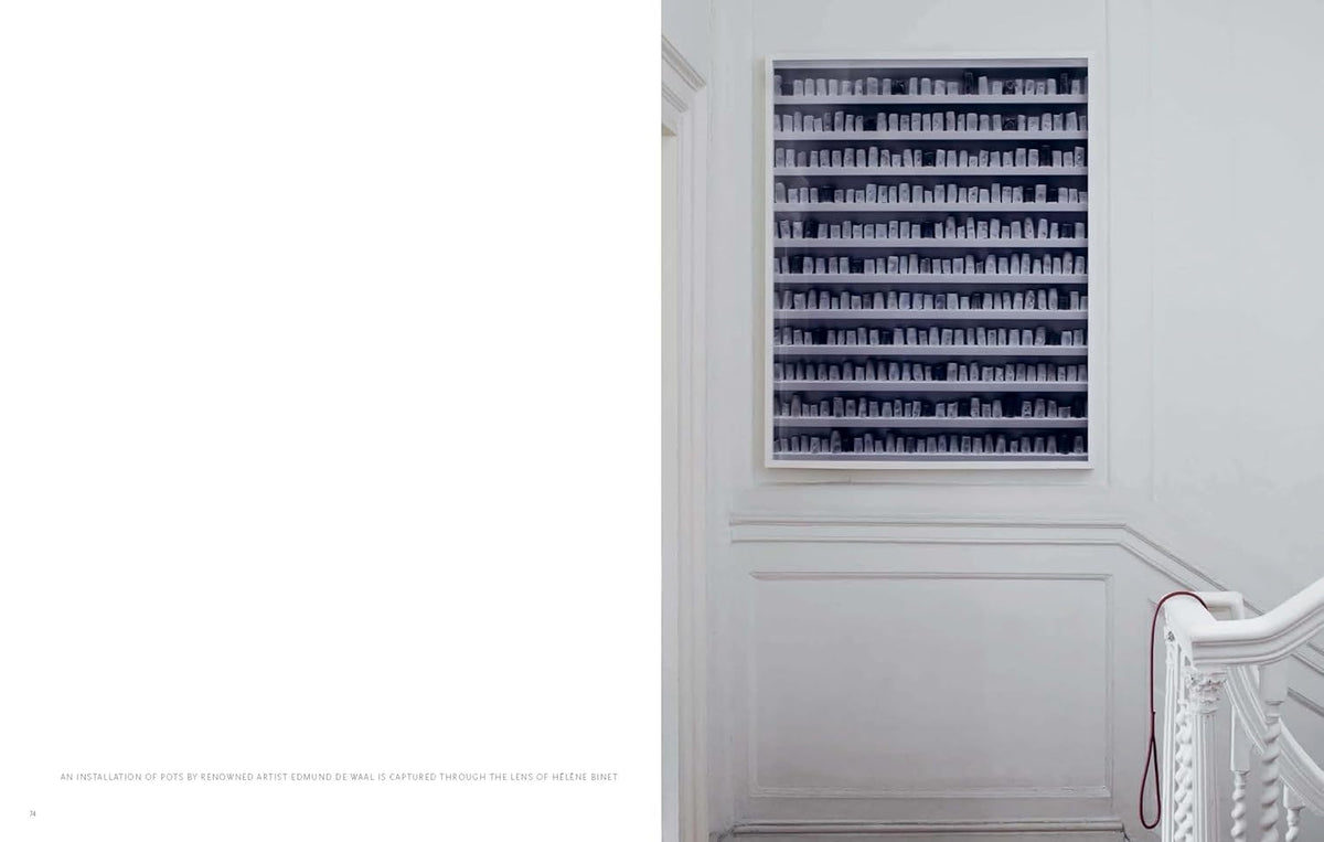Art in Residence page spread showing a coastal home