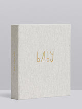 Light grey baby journal album with 'BABY' text in gold on a light gray background
