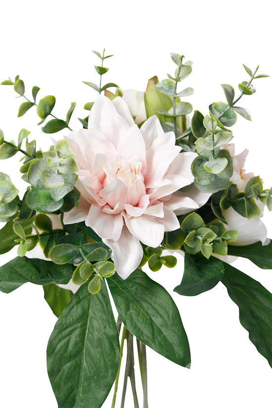 Side view of the faux bouquet showing a blush dahlia, eucalyptus and green leaves