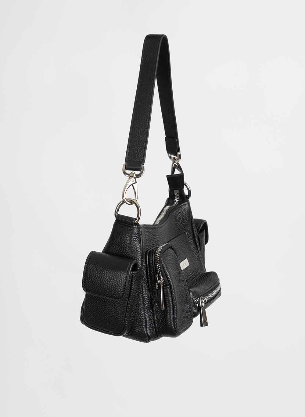 Busy Day Bag in black, side view showing the pockets and strap