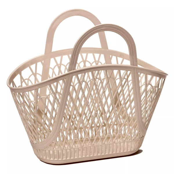 The Sun Jellies Betty Basket, a white basket with handles, showcases a feminine design on a recyclable material.