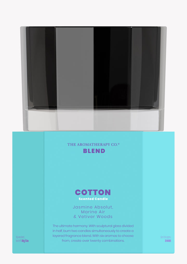 Blend Cotton scented candle in black glass stacked on its aqua box