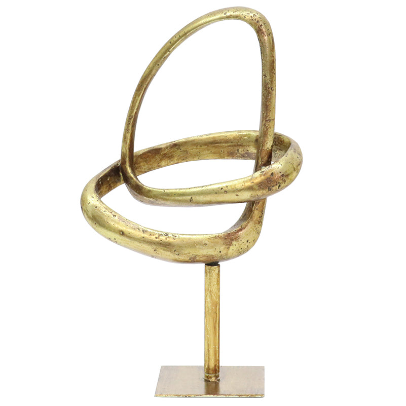 Loop Sculpture 09 in gold, two linked rings on a slim stand with a square base, plain background