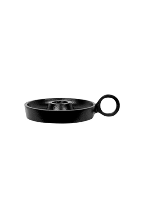 Shallow round black candle holder with a central taper socket and a ring handle, on white