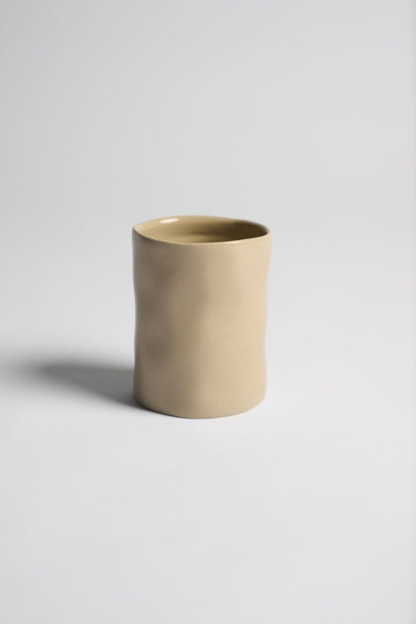 Cashmere tumbler on a pale grey backdrop
