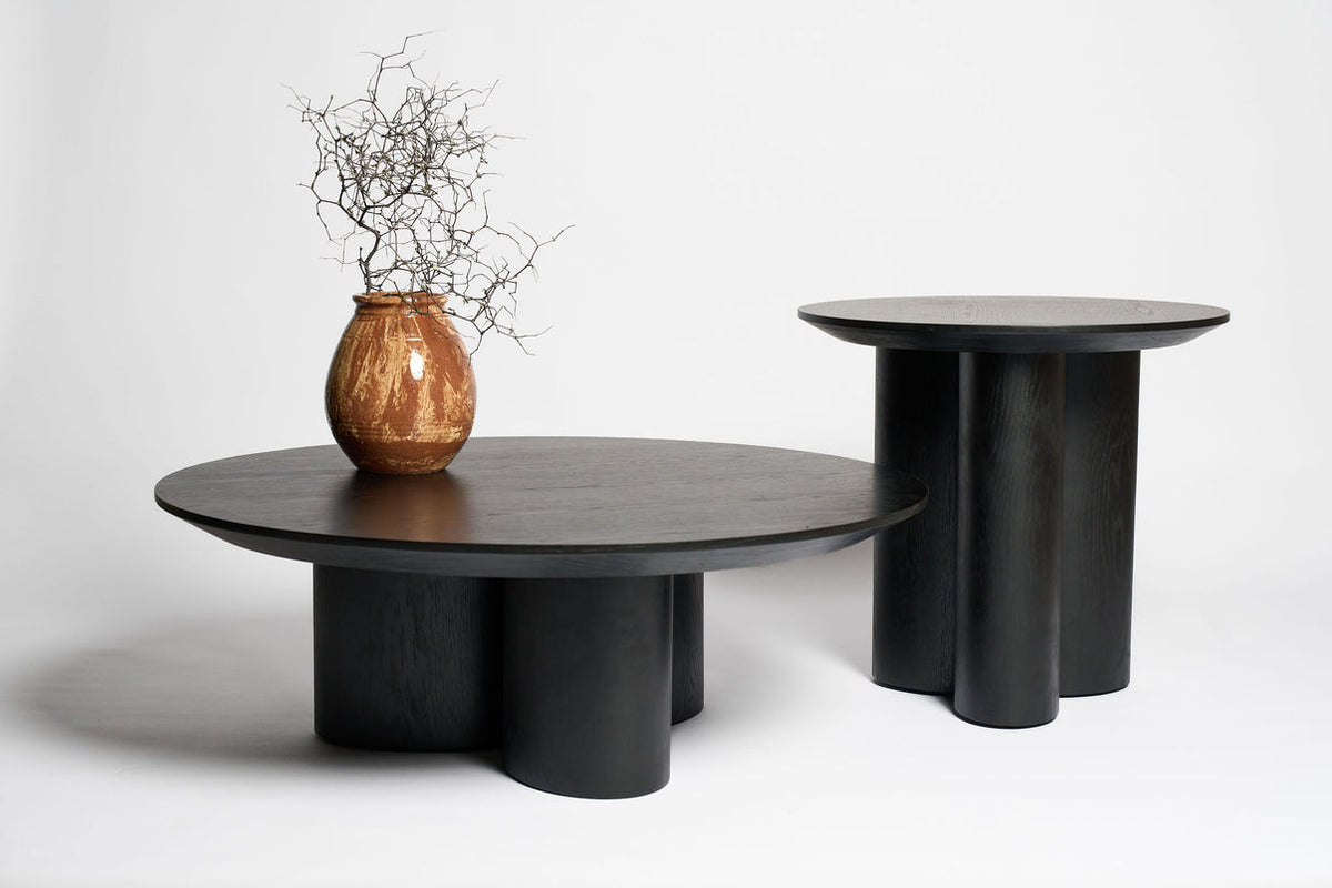 Nova Coffee Table in black oak styled with a rug