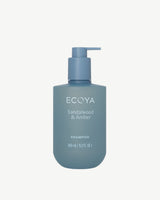 Ecoya Sandalwood and Amber shampoo in a 450ml blue-grey pump bottle