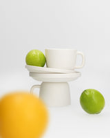 Ecoya Tahitian Lime and Grapefruit surface spray shown cleaning a bench