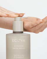Ecoya Tahitian Lime & Grapefruit kitchen hand wash being pumped into a pair of hands