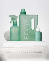 Ecoya Wild Sage and Citrus laundry liquid shown in use