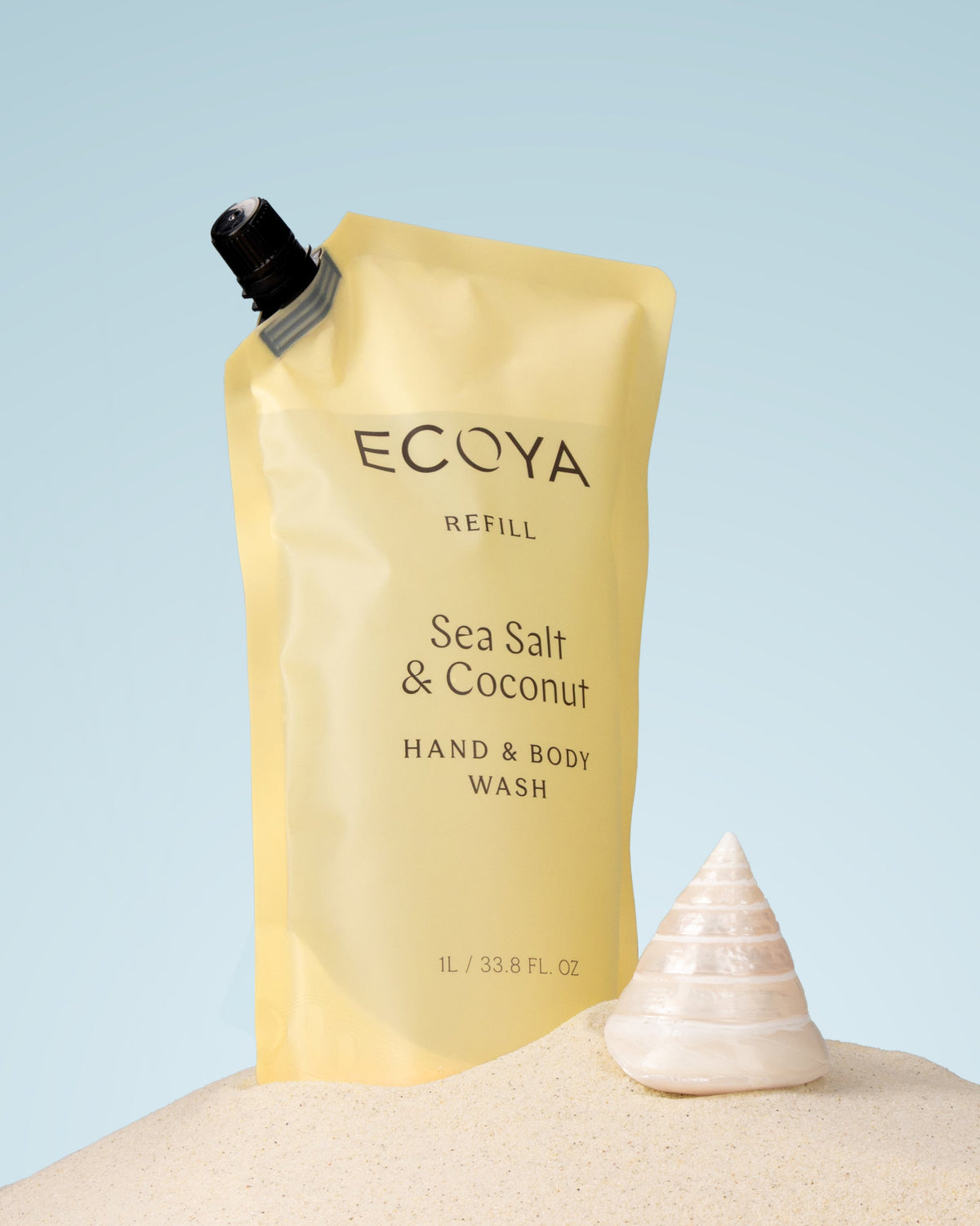 Ecoya Sea Salt and Coconut 1L refill styled beside the 450ml hand and body wash