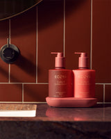 Ecoya Guava and Lychee Sorbet bathroom set styled beside a basin